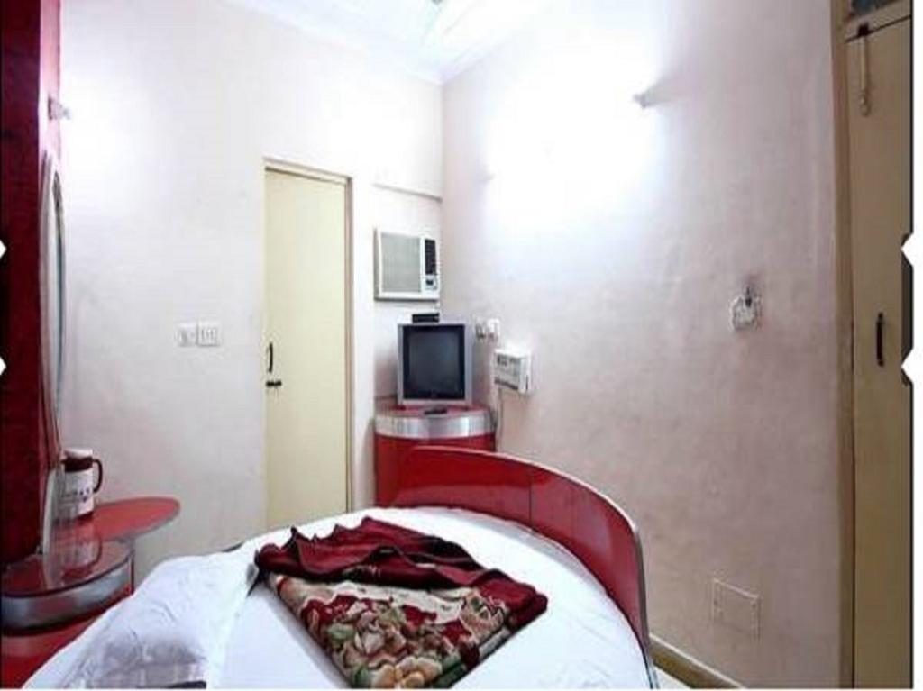 Hotel Hans International Nova Deli Quarto foto